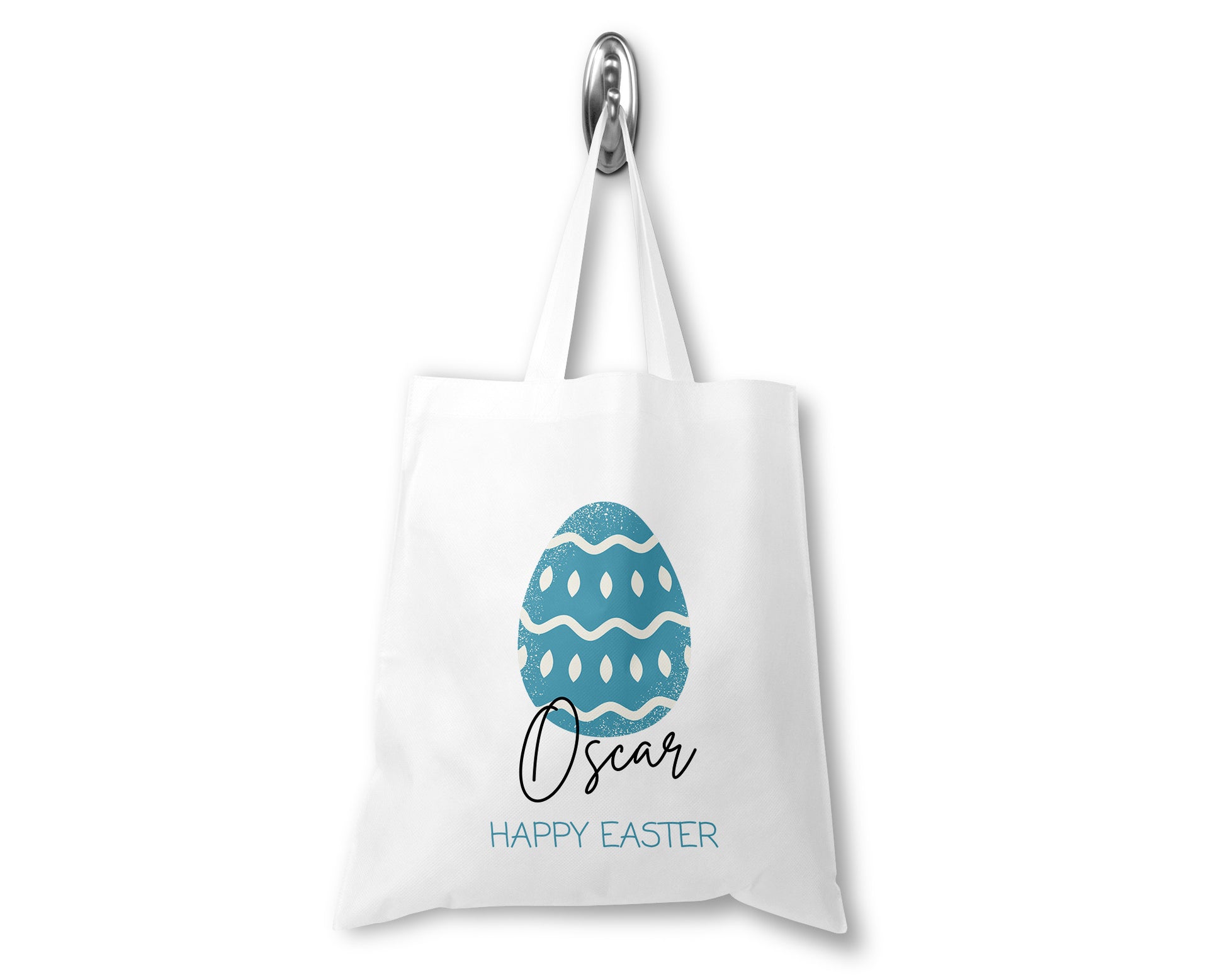 Unique personalised Easter tote bag with a blue patterned egg and the name “Oscar” printed beneath – a thoughtful and reusable gift for kids, perfect for Easter egg hunts.