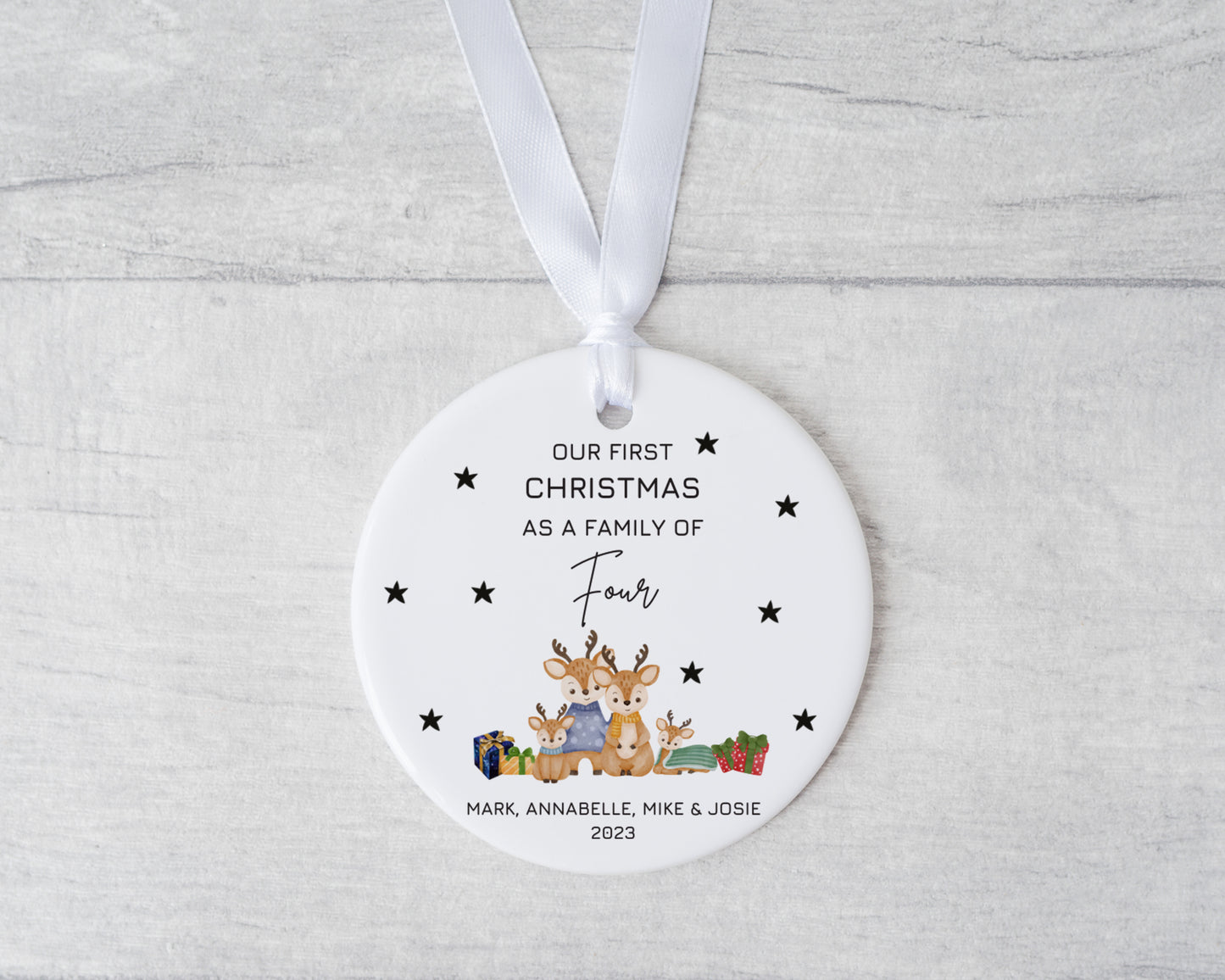 Unique personalised family of four first Christmas ornament 2023 – custom ceramic bauble with names and reindeer design gift
