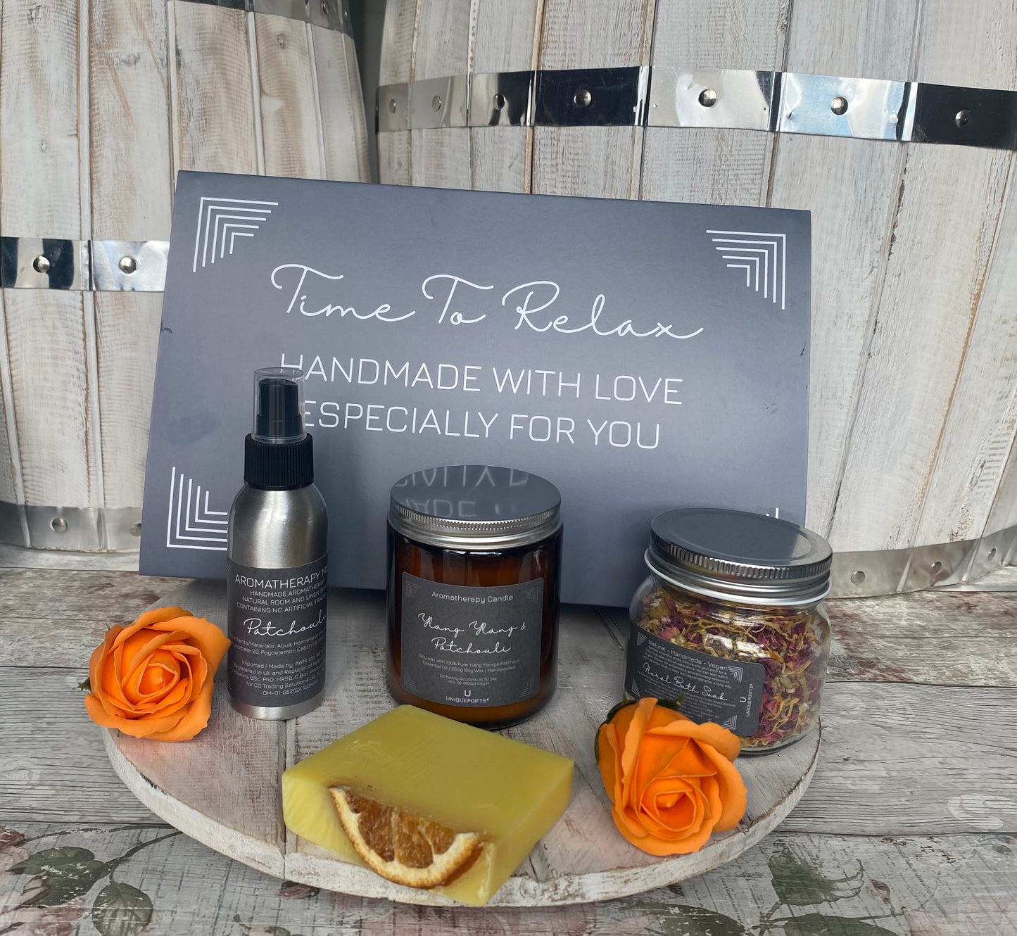 Handmade relaxation gift set with aromatherapy mist, soy candle, bath salts, and natural soap – perfect self-care or pamper gift box