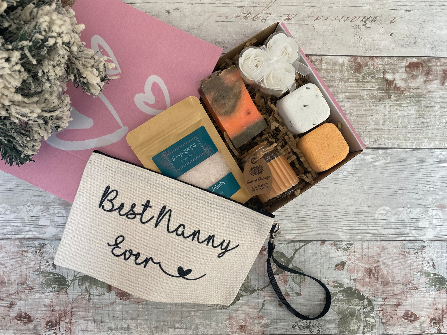Best Nanny Ever gift box with pamper essentials – includes bath salts, handmade soap, bath bomb, rose soap flowers, soy wax candle, and a canvas makeup pouch – ideal Christmas or birthday gift for nanny.