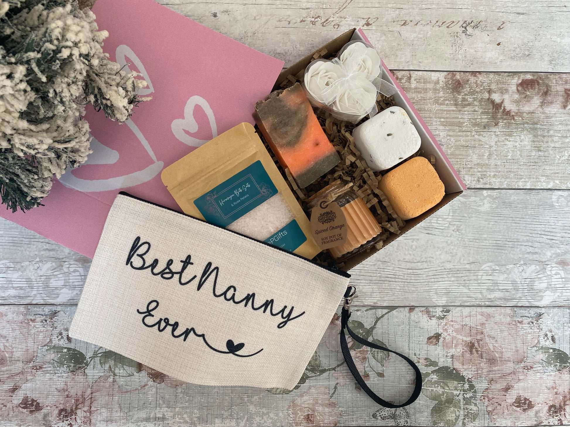 Best Nanny Ever gift box with pamper essentials – includes bath salts, handmade soap, bath bomb, rose soap flowers, soy wax candle, and a canvas makeup pouch – ideal Christmas or birthday gift for nanny.