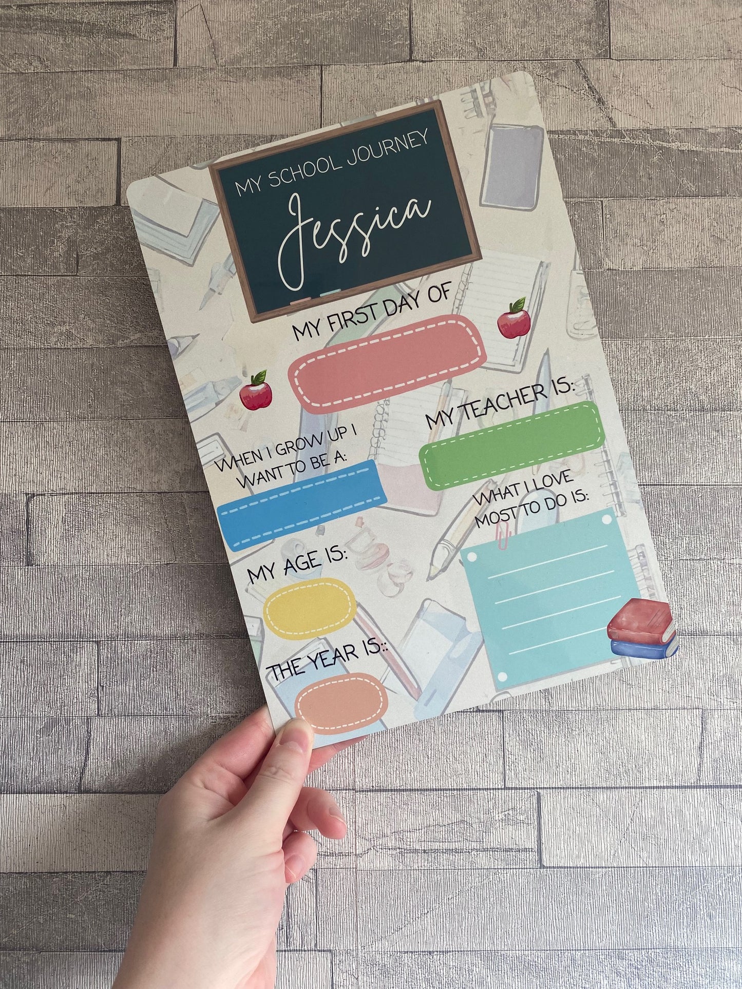 Personalised “My School Journey” first day board with child’s name Jessica, fill-in sections for school milestones including teacher’s name, age, year, dream job, and favourite activities. Colourful dry-erase keepsake for back-to-school photos and memories.