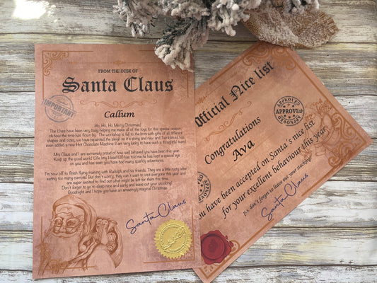 Letter and certificate from Santa Claus on a wooden surface with decorative elements.