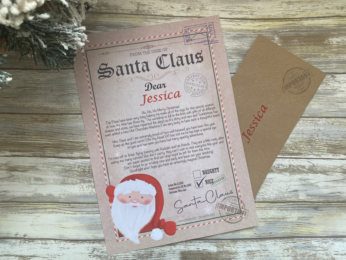Letter from Santa Claus addressed to Jessica on a wooden surface