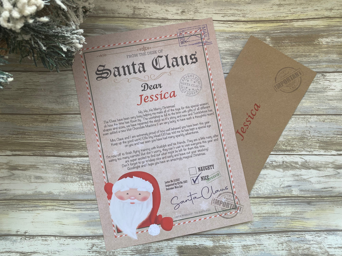 Letter from Santa Claus addressed to Jessica on a wooden surface