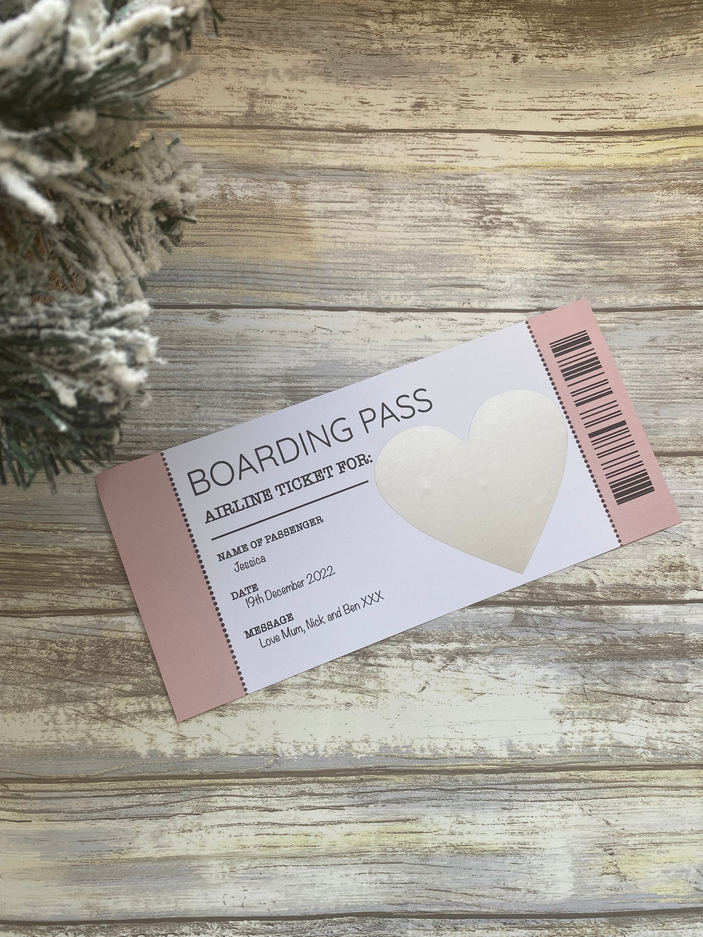 Boarding pass on a wooden surface with decorative elements