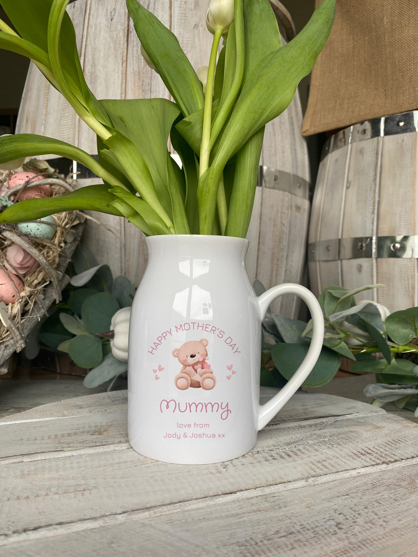 White ceramic vase with handle, pink teddy bear and heart design, and personalised Mother’s Day message, perfect gift for Mummy
