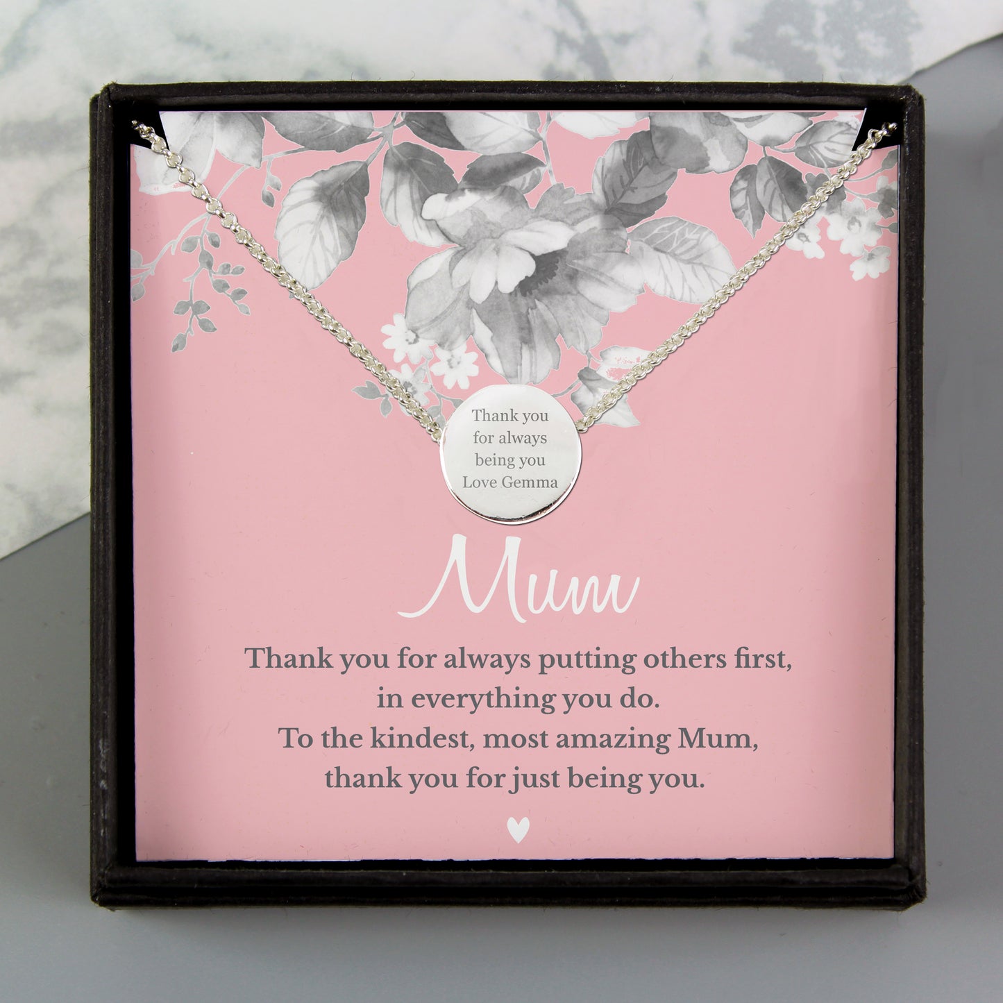 Necklace in a decorative box with floral design and text for a mother