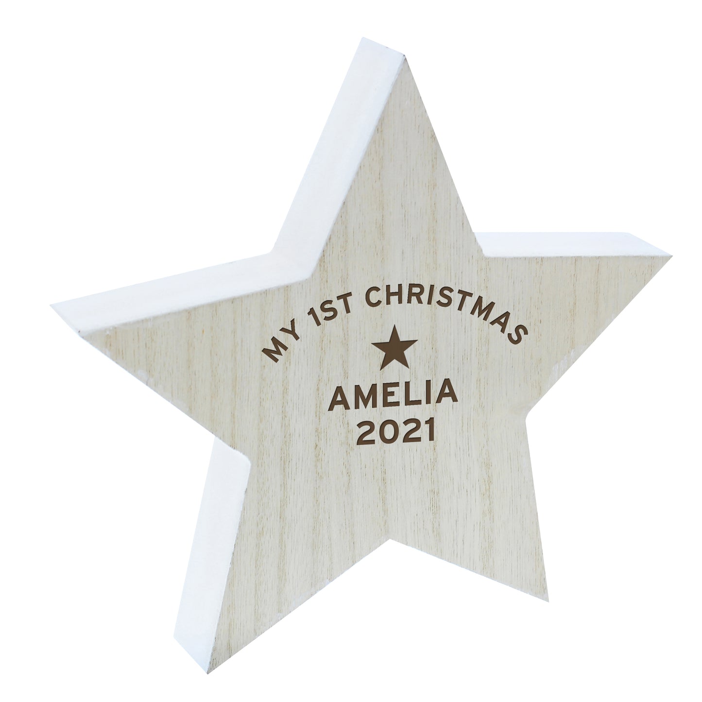 Wooden star ornament with 'My 1st Christmas Amelia 2021' engraving on a white background