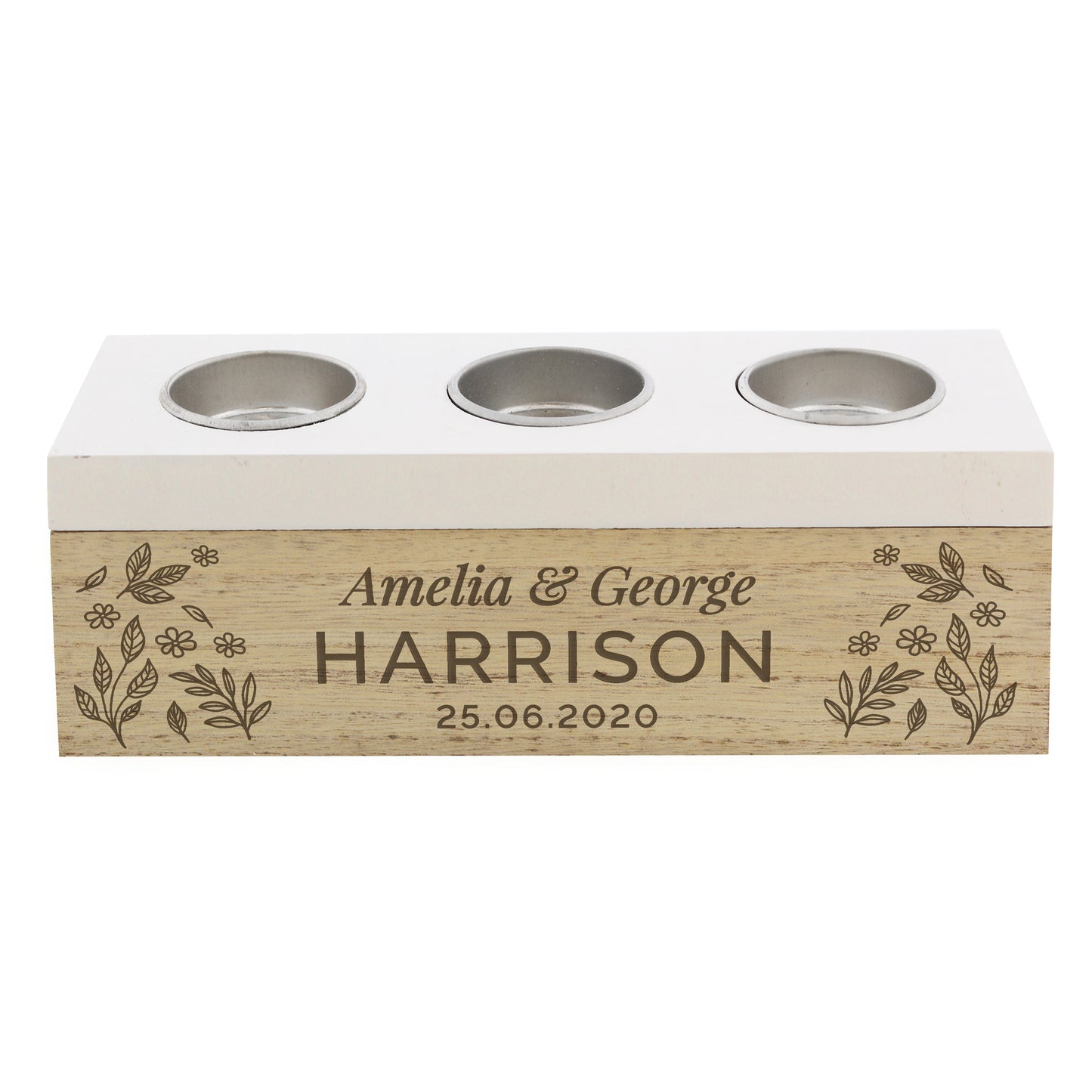 Three-socket candle holder with wooden base engraved with 'Amelia & George Harrison' and date on a white background.