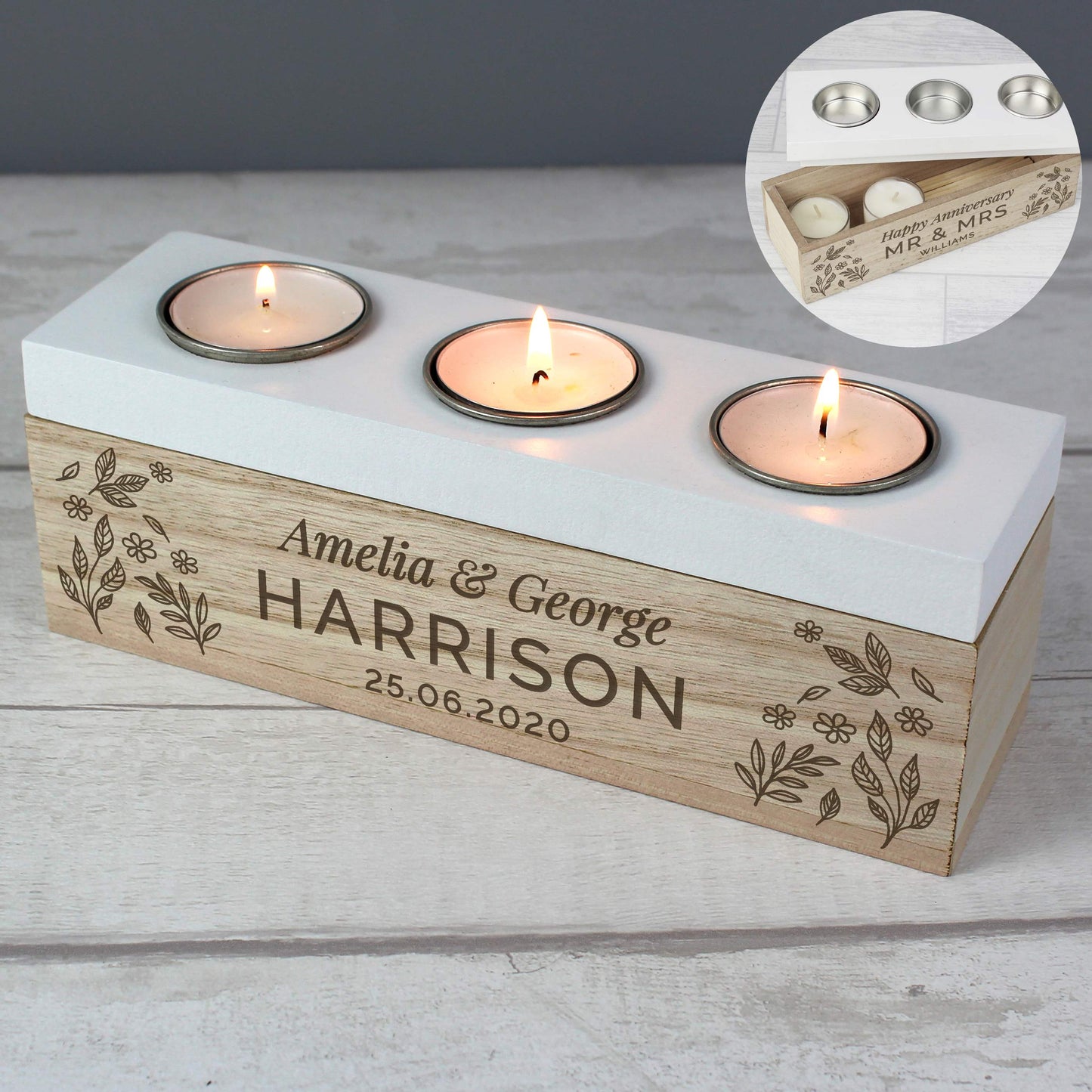 Personalised candle holder with engraved names and date on a wooden base, featuring three lit candles.