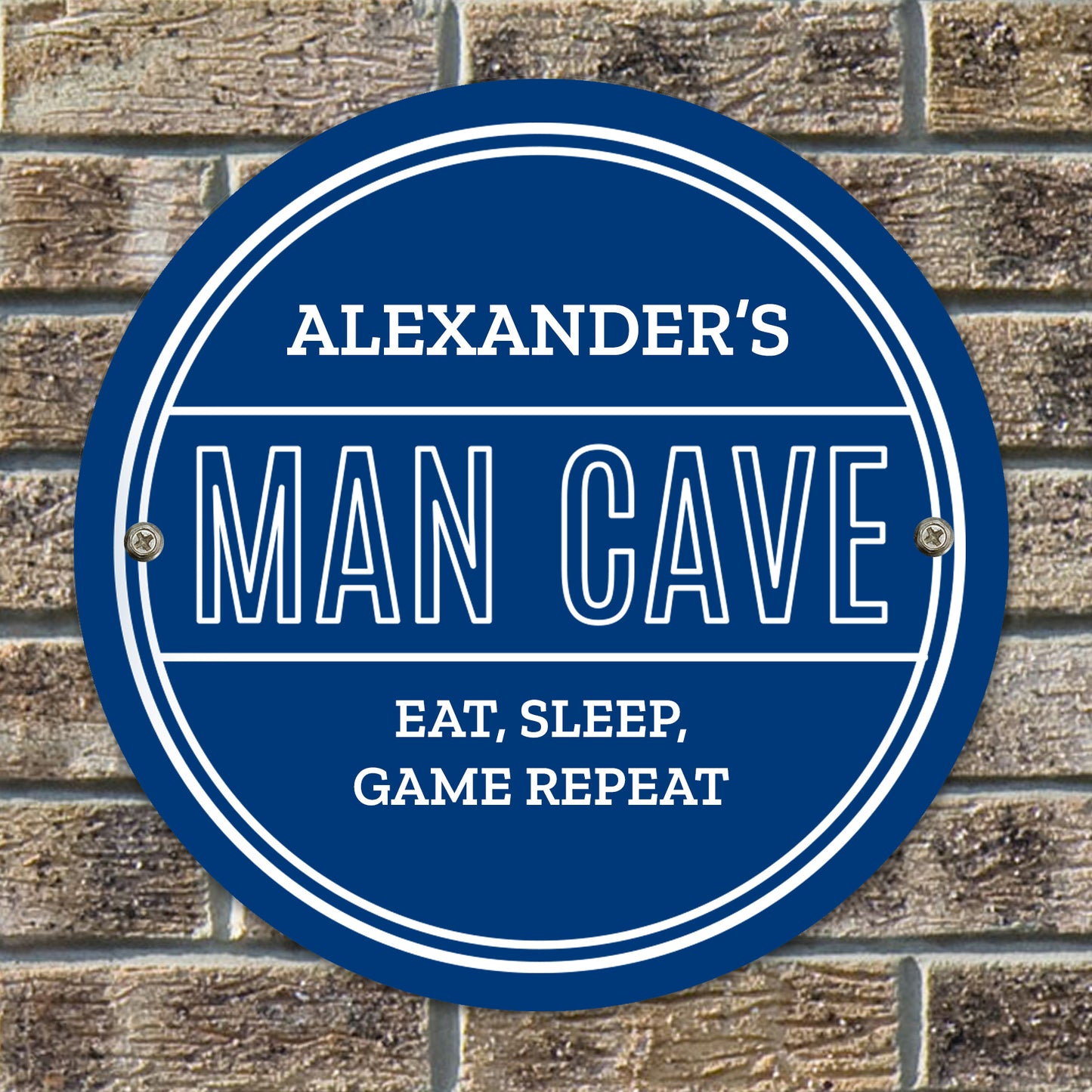 Blue sign with 'Alexander's Man Cave' text on a brick wall background