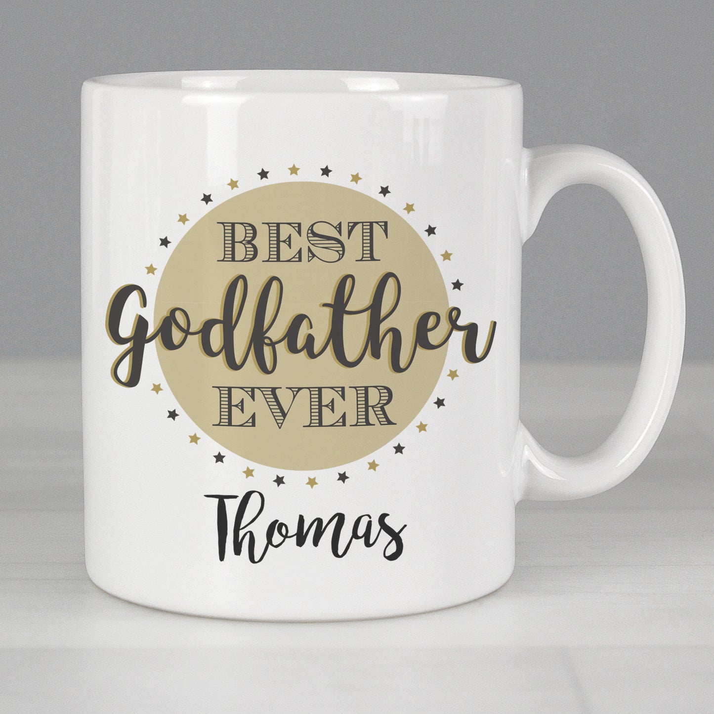 White mug with 'Best Godfather Ever Thomas' text on a grey background