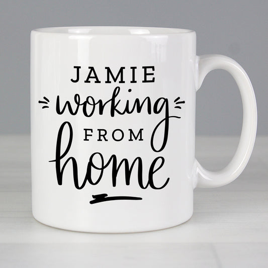 Personalised White mug with 'Jamie working from home' text on a gray background