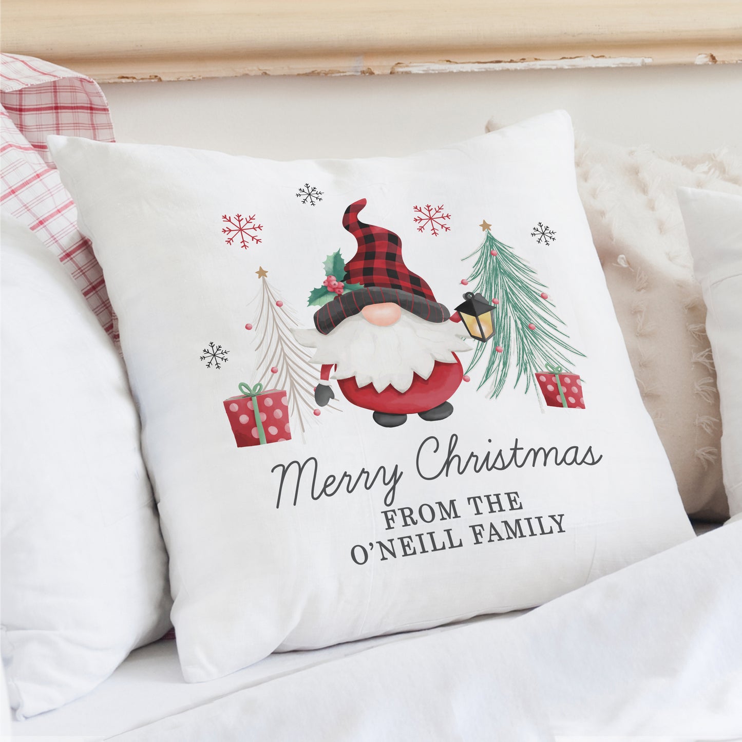 Decorative Christmas pillow with gnome character, personalised with family name, perfect for seasonal home decor
