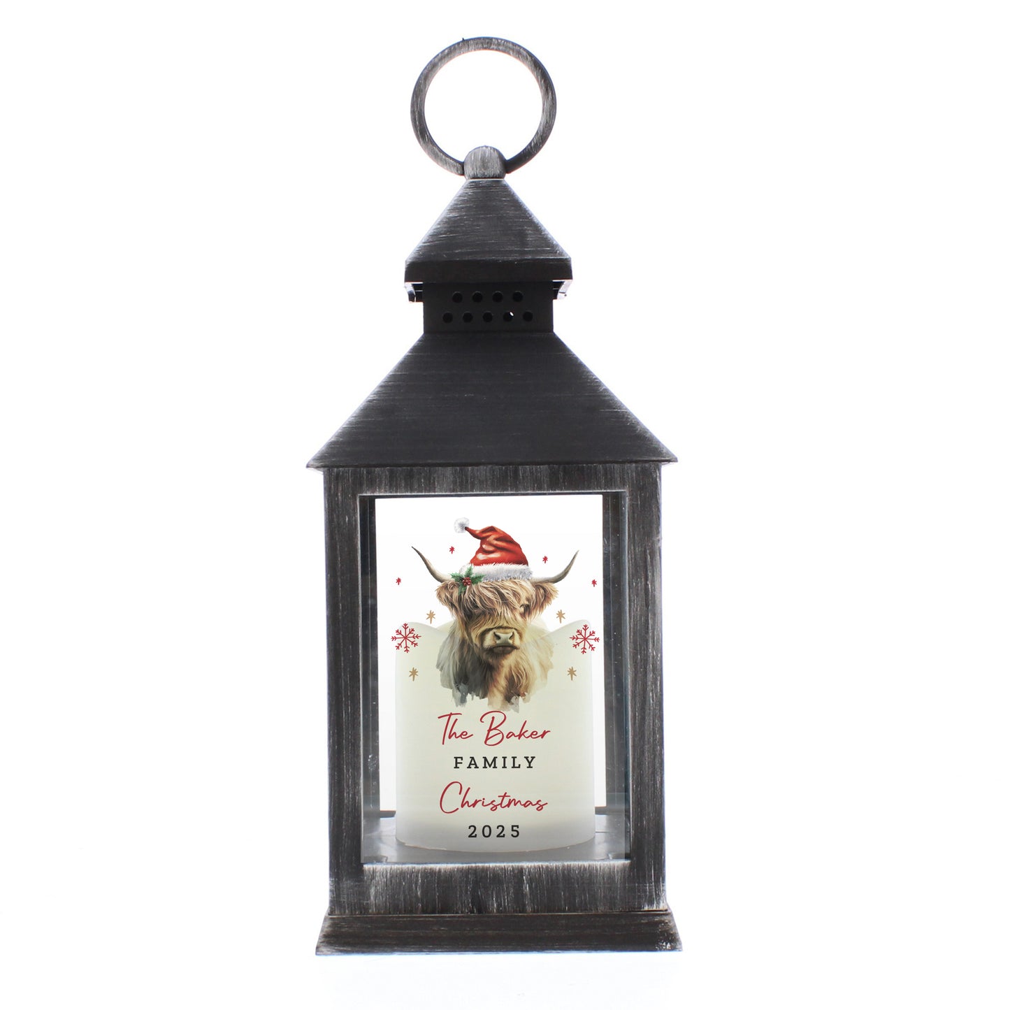 Black lantern with a festive design featuring a highland cow wearing a Santa hat on a white background.