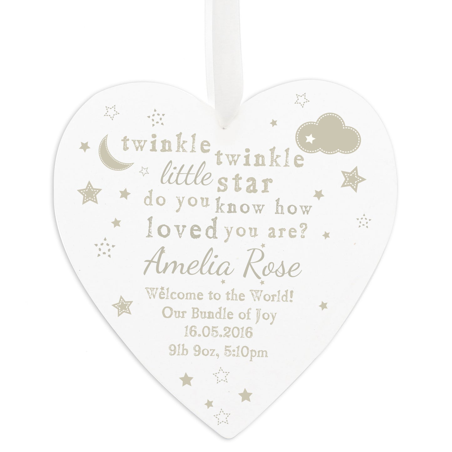 Heart-shaped decorative plaque with baby-themed text and graphics on a white background