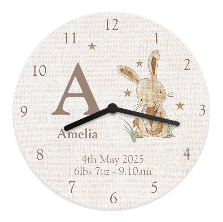 Round clock with a rabbit illustration and personalised text on a white background