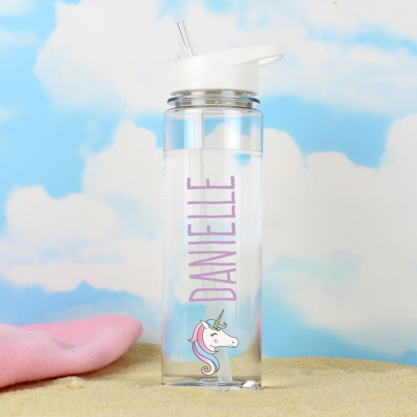 Clear water bottle with unicorn design and 'DANIELLE' text against a cloud background