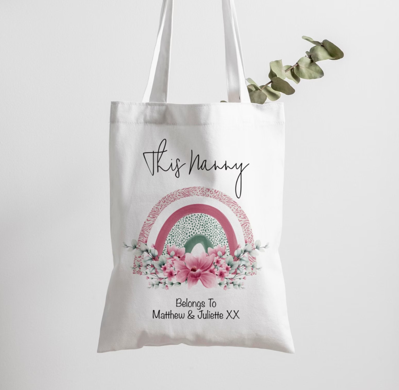 Unique personalised tote bag for Nanny featuring custom names, a pink and green rainbow design, and floral accents – the perfect gift for a special grandmother.