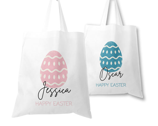 Unique personalised Easter tote bags featuring pastel pink and blue patterned eggs with custom names “Jessica” and “Oscar” – a thoughtful gift for children or Easter egg hunts.