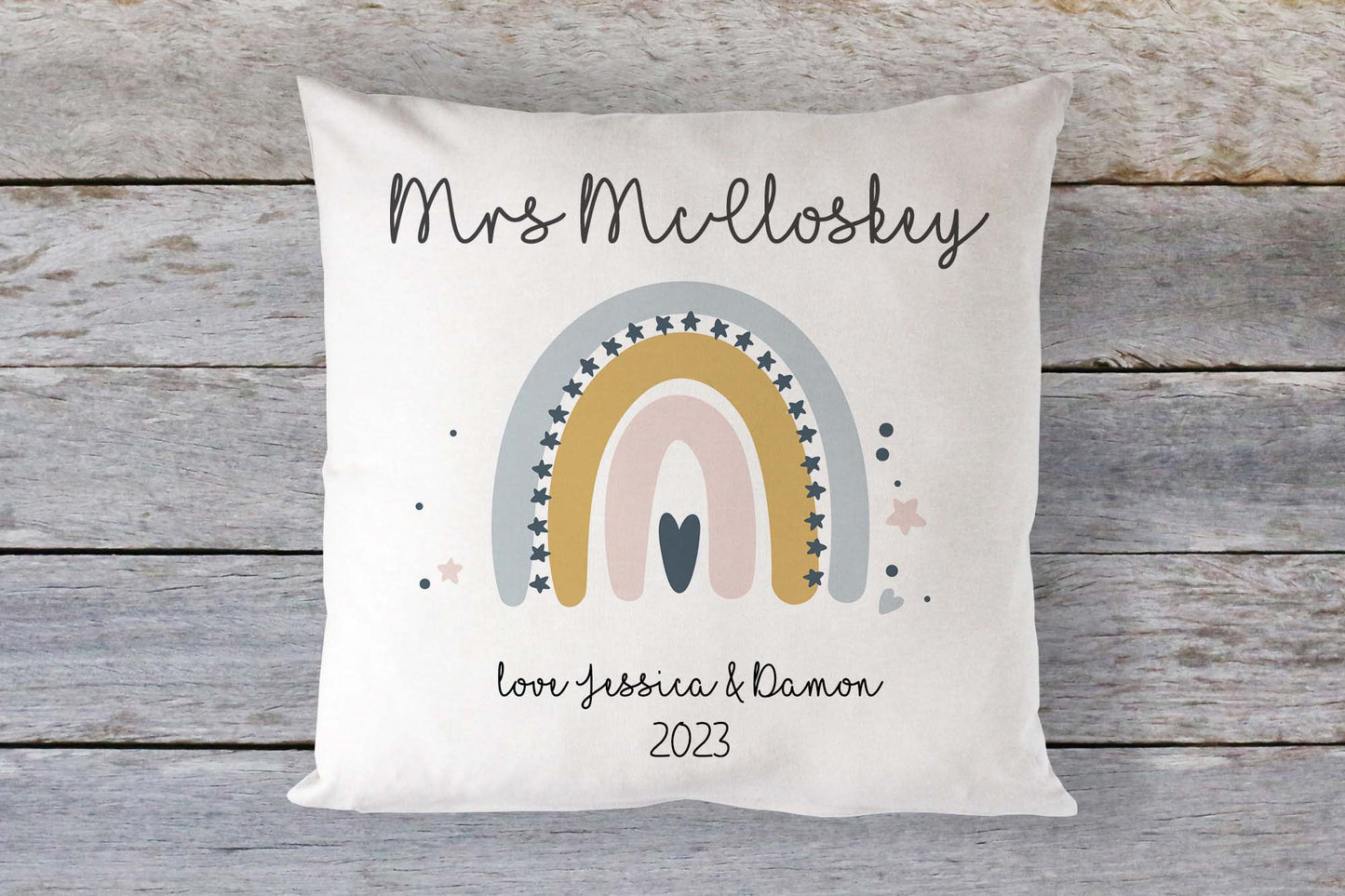 Personalised teacher cushion with name 'Mrs McCloskey' and rainbow design – thank you gift from students with custom message 'love Jessica & Damon 2023', ideal for end-of-year teacher appreciation
