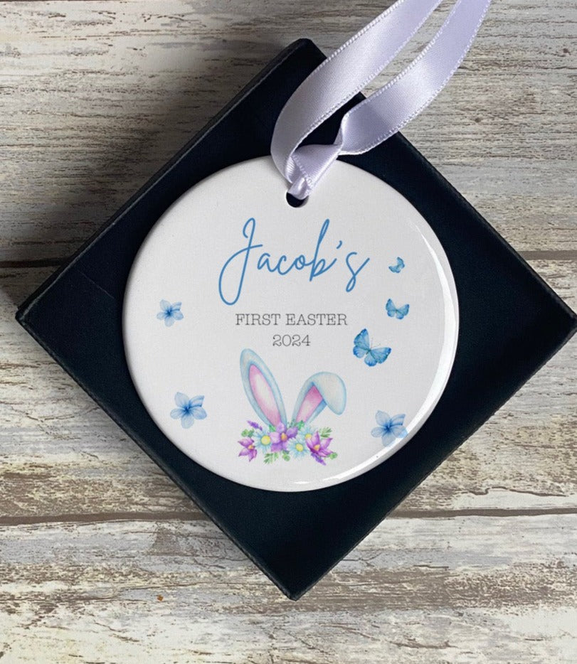 Personalised blue Easter bauble with bunny ears and floral design – Jacob’s First Easter 2024 hanging decoration – custom baby boy’s first Easter keepsake gift