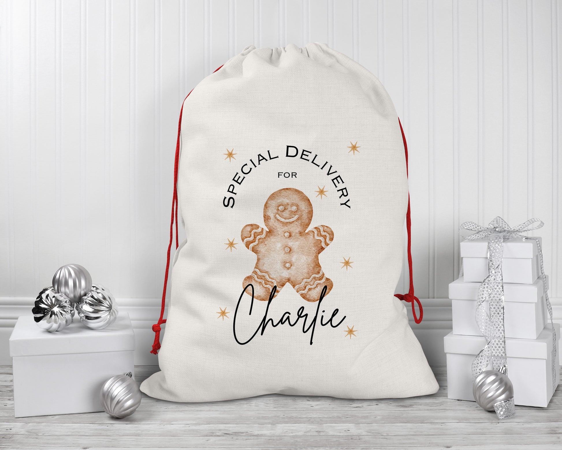 Personalised large Christmas sack with gingerbread man design, custom name Santa gift bag for kids, festive linen present sack with red drawstring