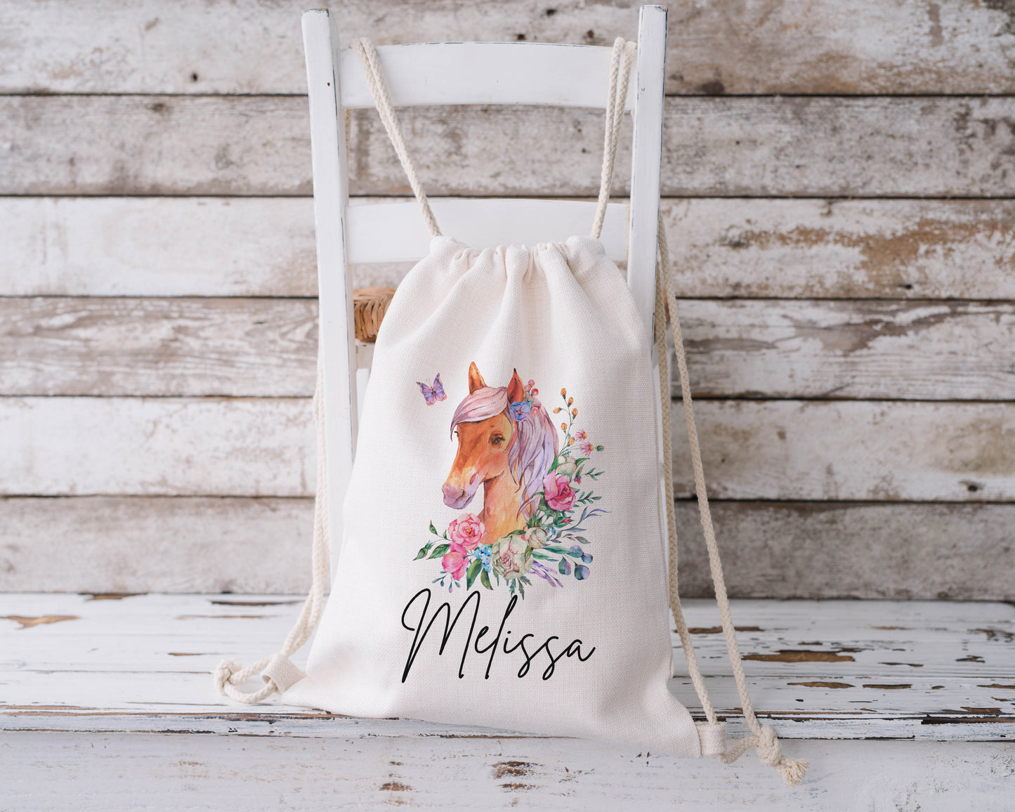 Personalised kids horse drawstring bag with name Melissa, floral watercolour pony design on cotton gym sack, custom school PE or nursery bag for girls