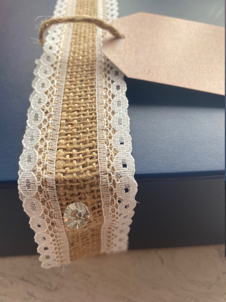 Decorative ribbon with lace on a plain background