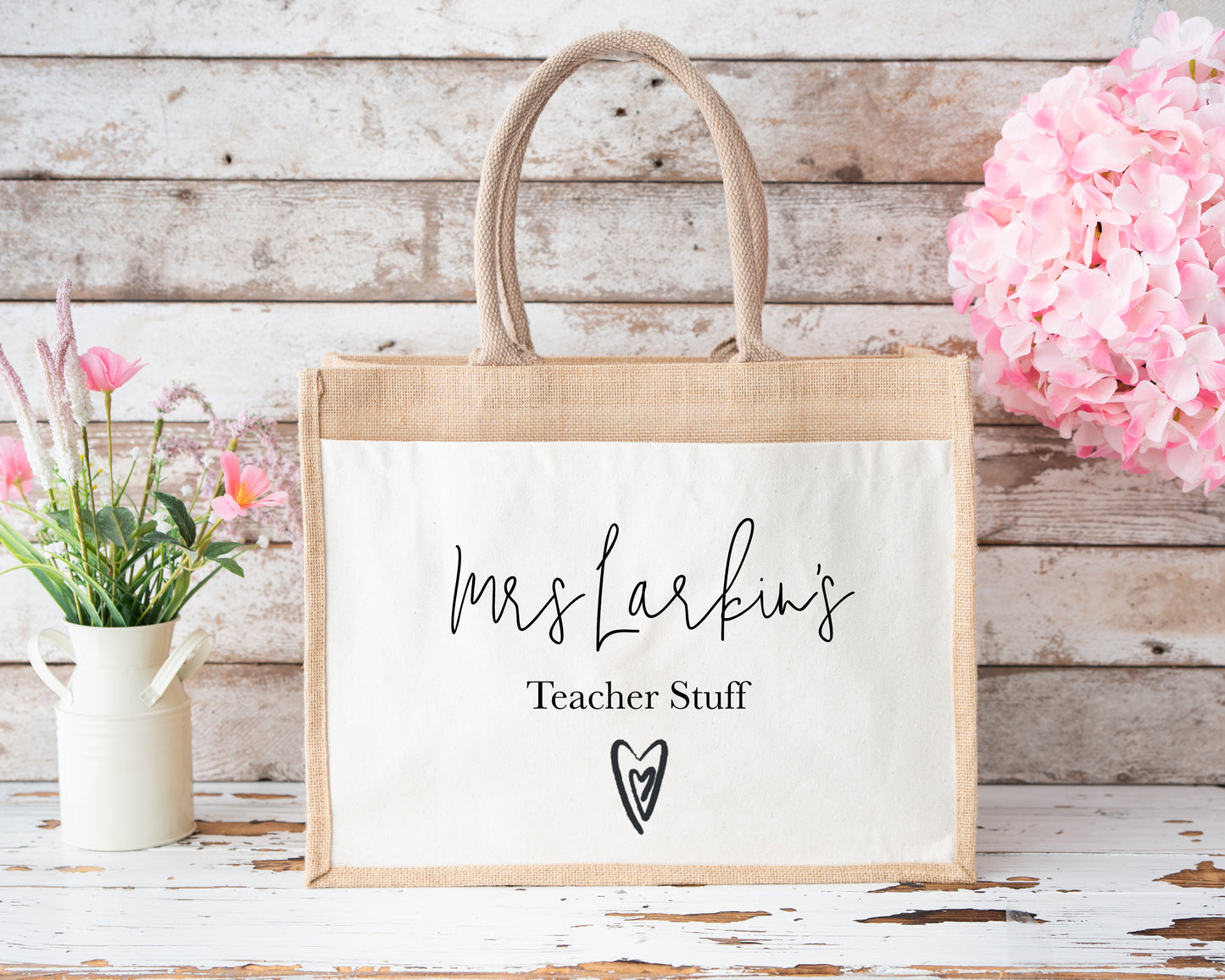 Custom teacher jute bag with “Mrs Larkin’s Teacher Stuff” print, sturdy natural handles and a heart design, ideal for end-of-term teacher gifts.