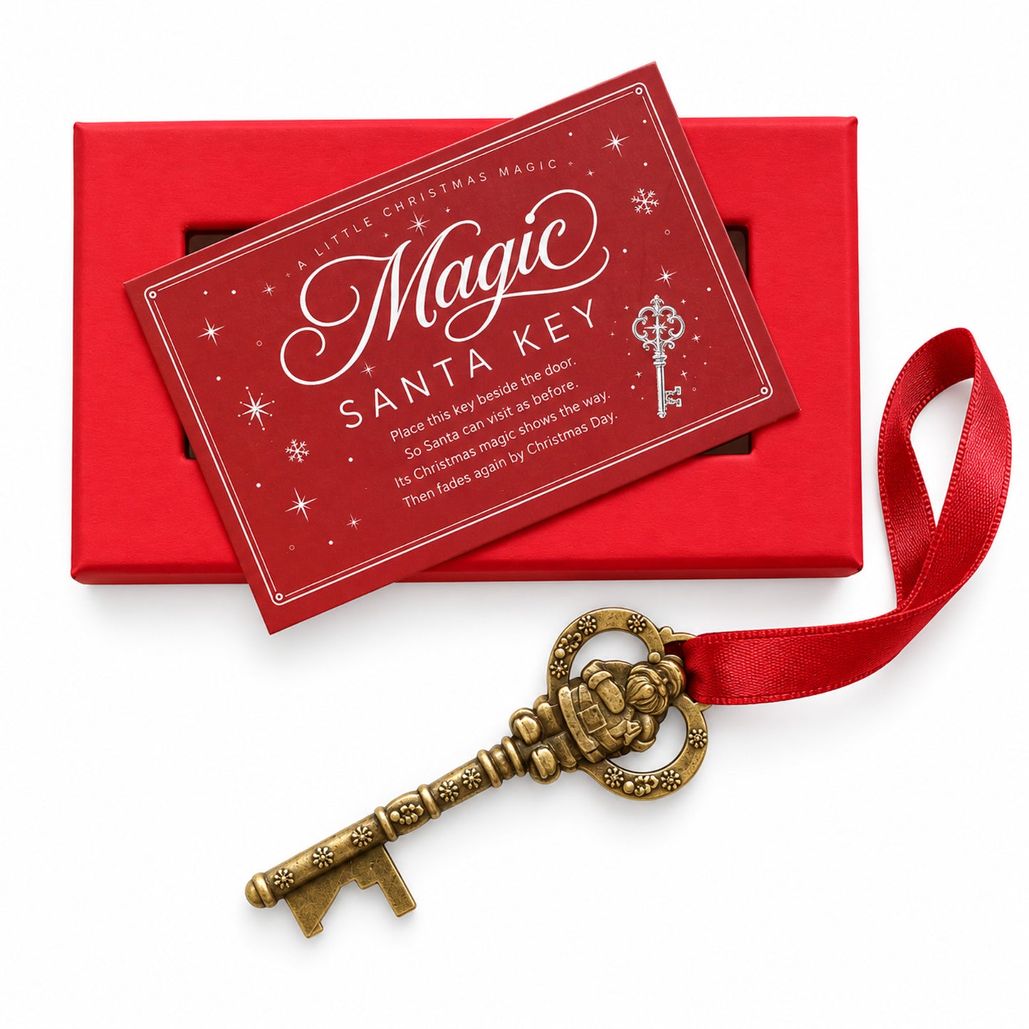 A Christmas-themed gift set featuring a vintage-style gold Santa key with a red ribbon, shown with a red gift box and a red card that reads 'Magic Santa Key' on a white background.