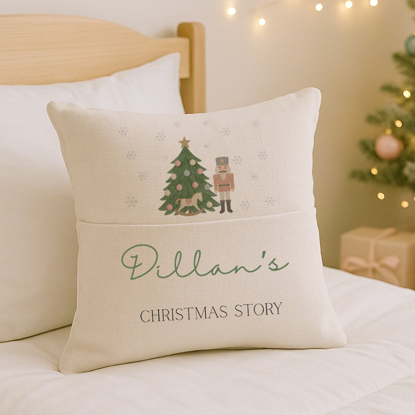 Decorative pillow with Christmas design and text on a bed with a festive background