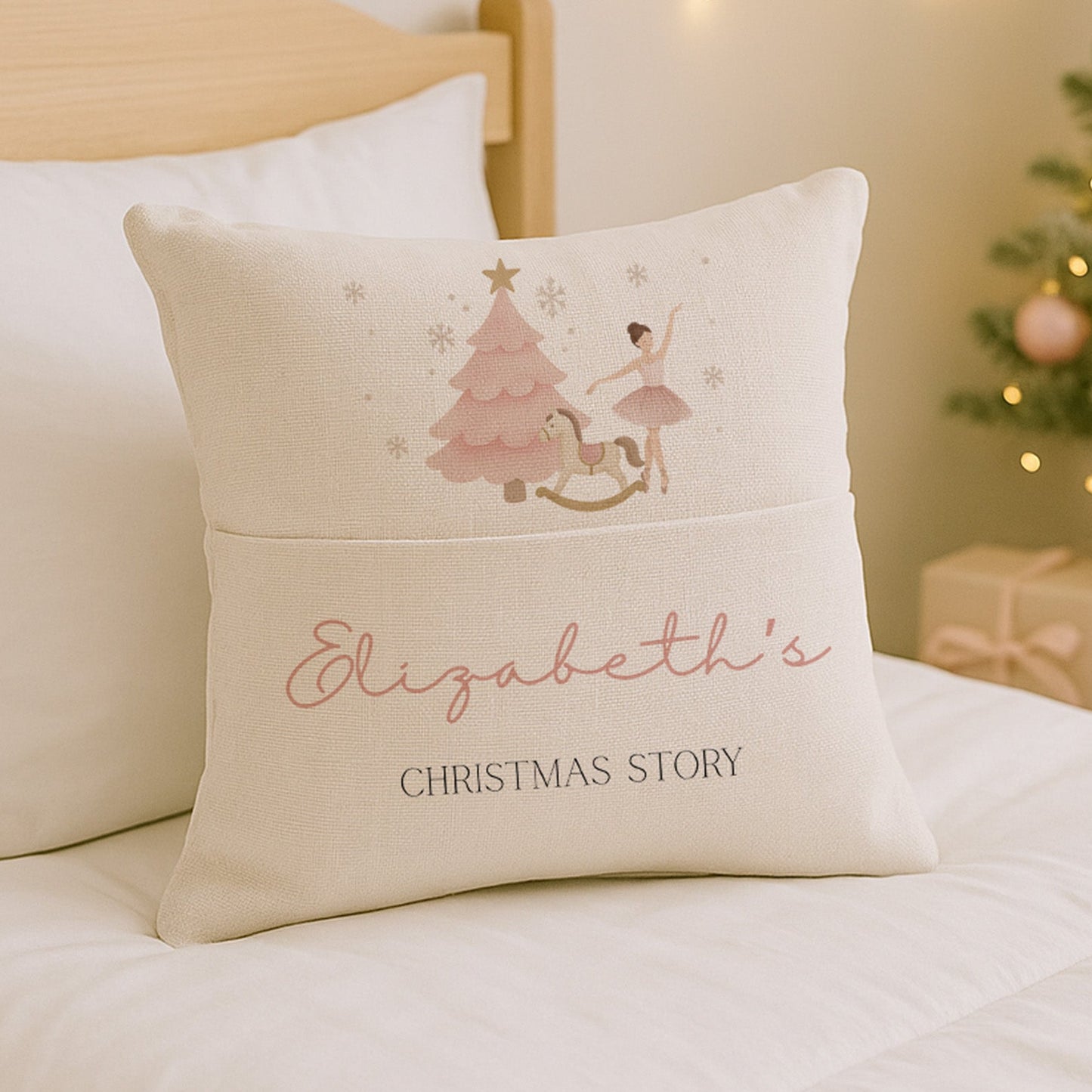 Decorative pillow with a Christmas design and text on a bed with a festive background