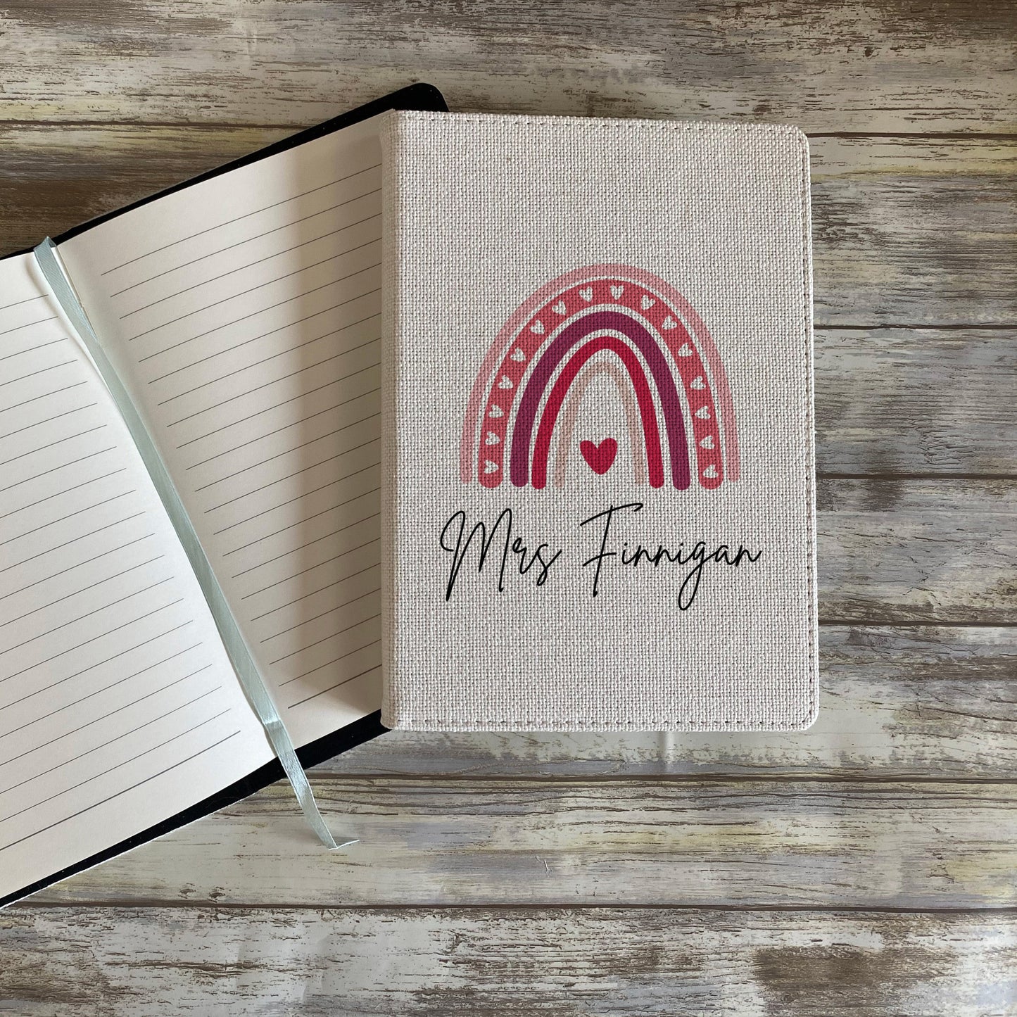 Personalised teacher notebook with pink rainbow and heart design, custom name Mrs Finnigan on linen cover, thoughtful end of year gift for teacher or teaching assistant