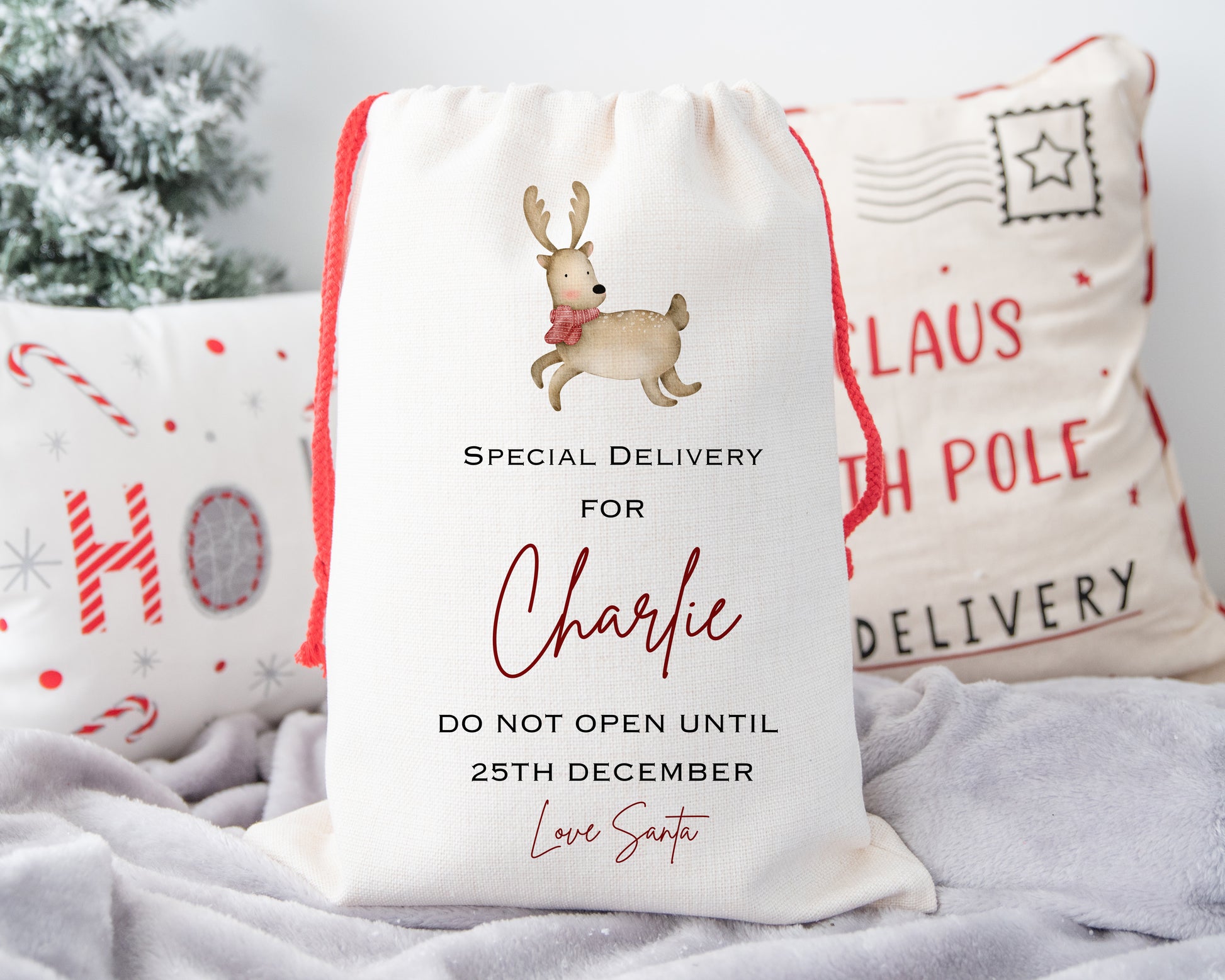 Unique personalised Christmas sack with cute reindeer design – “Special Delivery for Charlie – Do Not Open Until 25th December – Love Santa” – festive custom gift bag for kids
