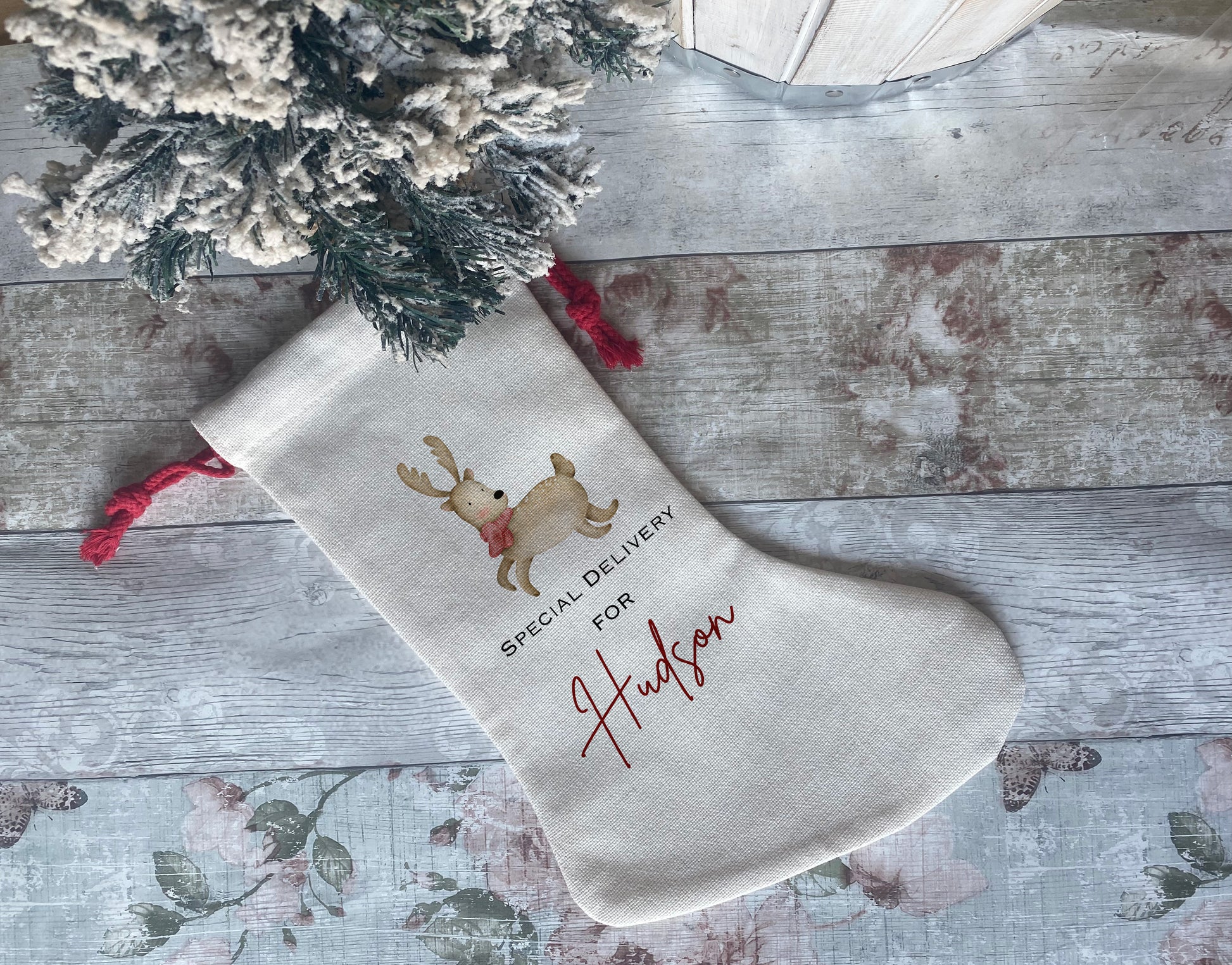 Personalised Christmas stocking with reindeer design – special delivery gift sack for kids – custom name print, festive red drawstring, unique holiday keepsake