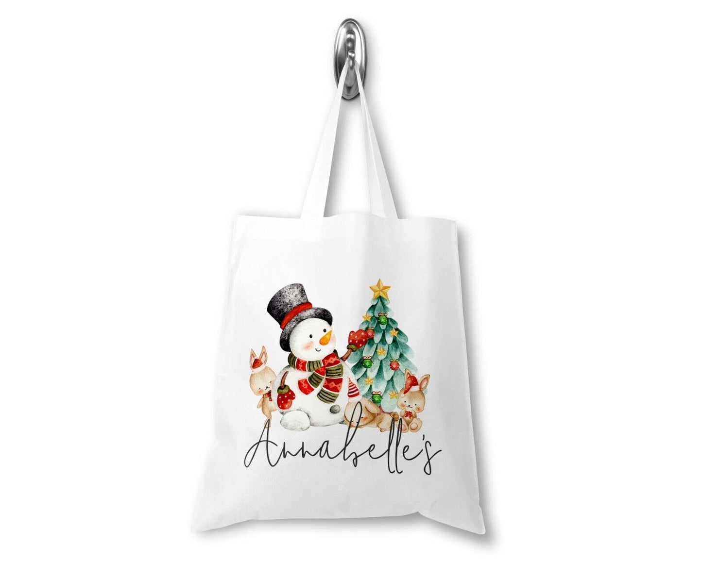 White tote bag with a snowman and Christmas tree design, featuring the name 'Annabelle'.