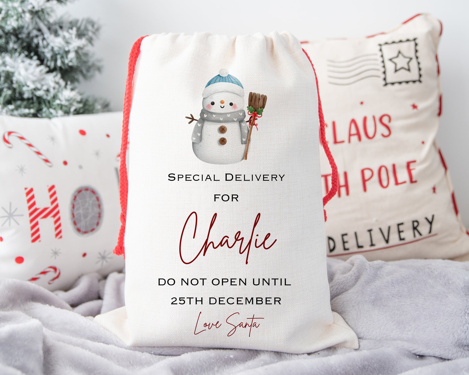 Unique personalised Christmas sack with snowman illustration – “Special Delivery for Charlie – Do Not Open Until 25th December – Love Santa” – custom festive gift bag