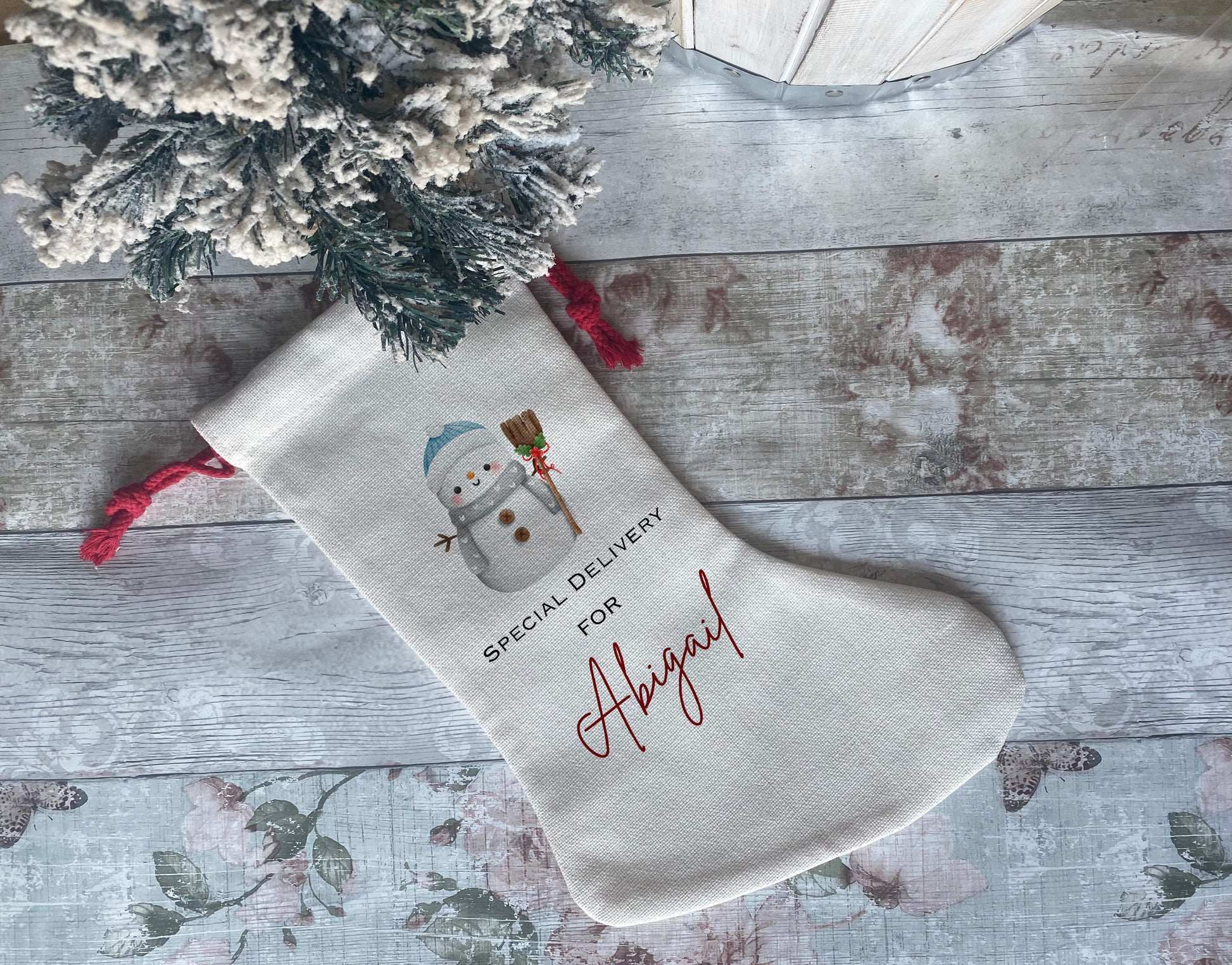 Personalised Christmas stocking with snowman design – custom holiday gift sack for kids – special delivery print with name, red drawstring, festive keepsake