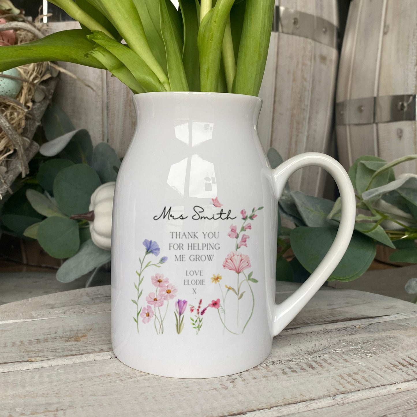 Personalised small flower vase for Teachers. Featuring the saying 'Thank you for helping me grow' and personalised with a name and who it's from.