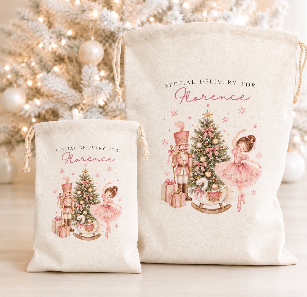 Two cream canvas drawstring gift bags with a festive Christmas illustration and the text 'SPECIAL DELIVERY FOR Florence,' displayed in front of a softly lit Christmas tree.