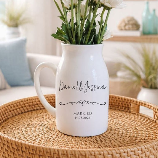 personalised wedding flower vase with custom text and wedding date, sat on a woven tray in a sunny living room