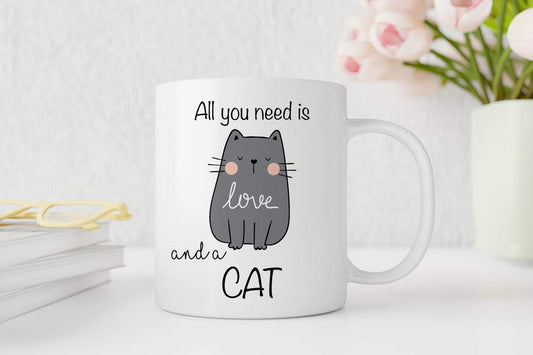 White mug with a cat illustration and text on a light background