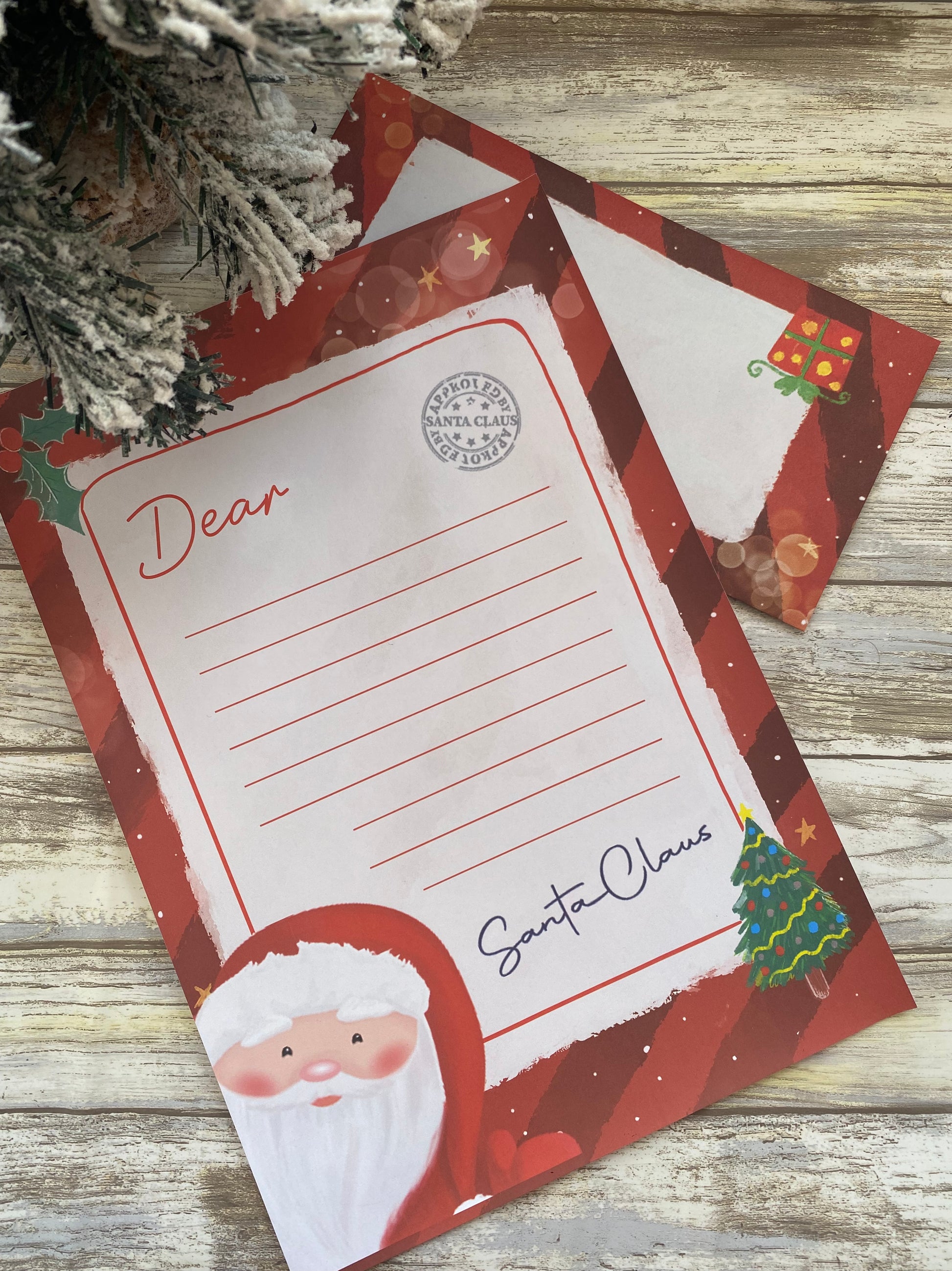 Letter to Santa Claus on a wooden surface