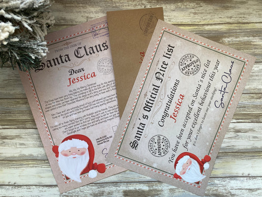 Two Christmas-themed cards on a wooden surface with Santa Claus illustrations.