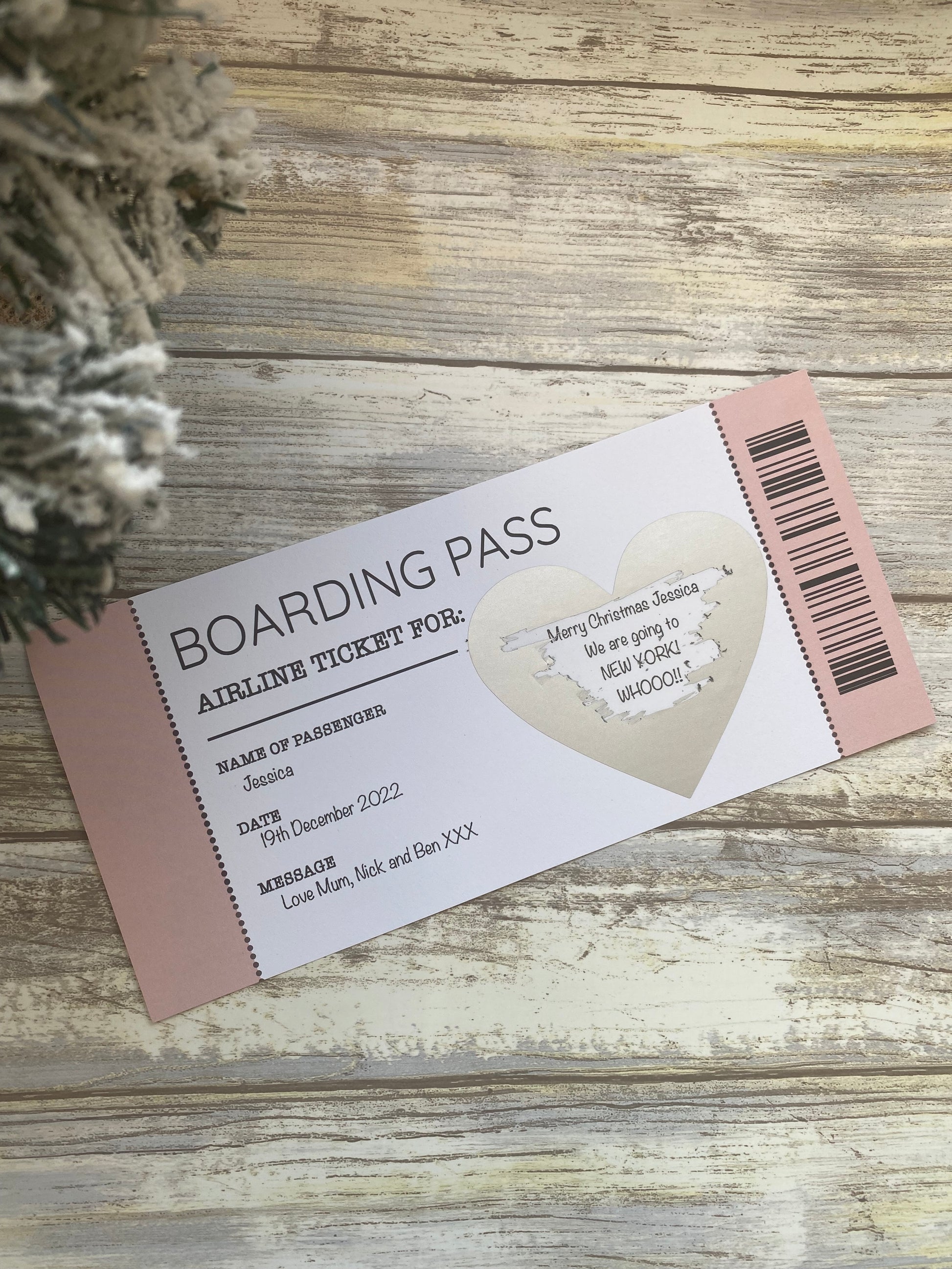 Boarding pass on a wooden surface with decorative elements
