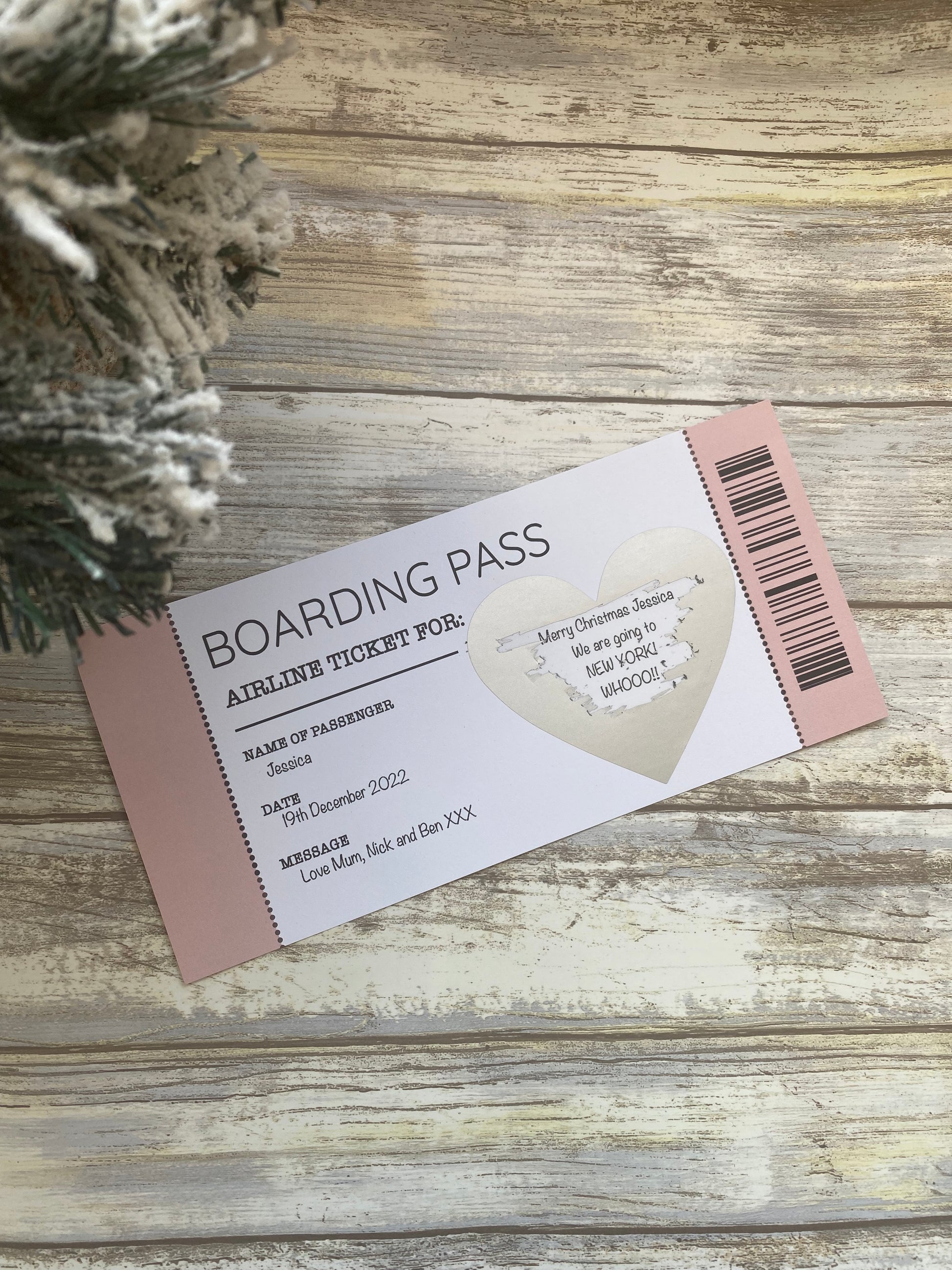Boarding pass on a wooden surface with decorative elements