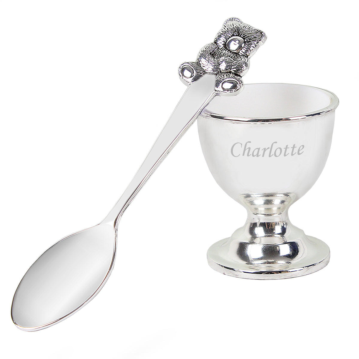 Personalised Silver egg cup with spoon and decorative handle on a white background