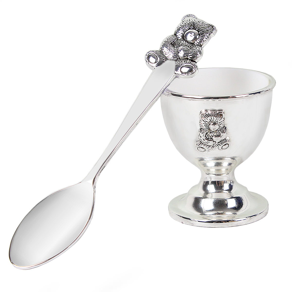 Silver egg cup with spoon on a white background